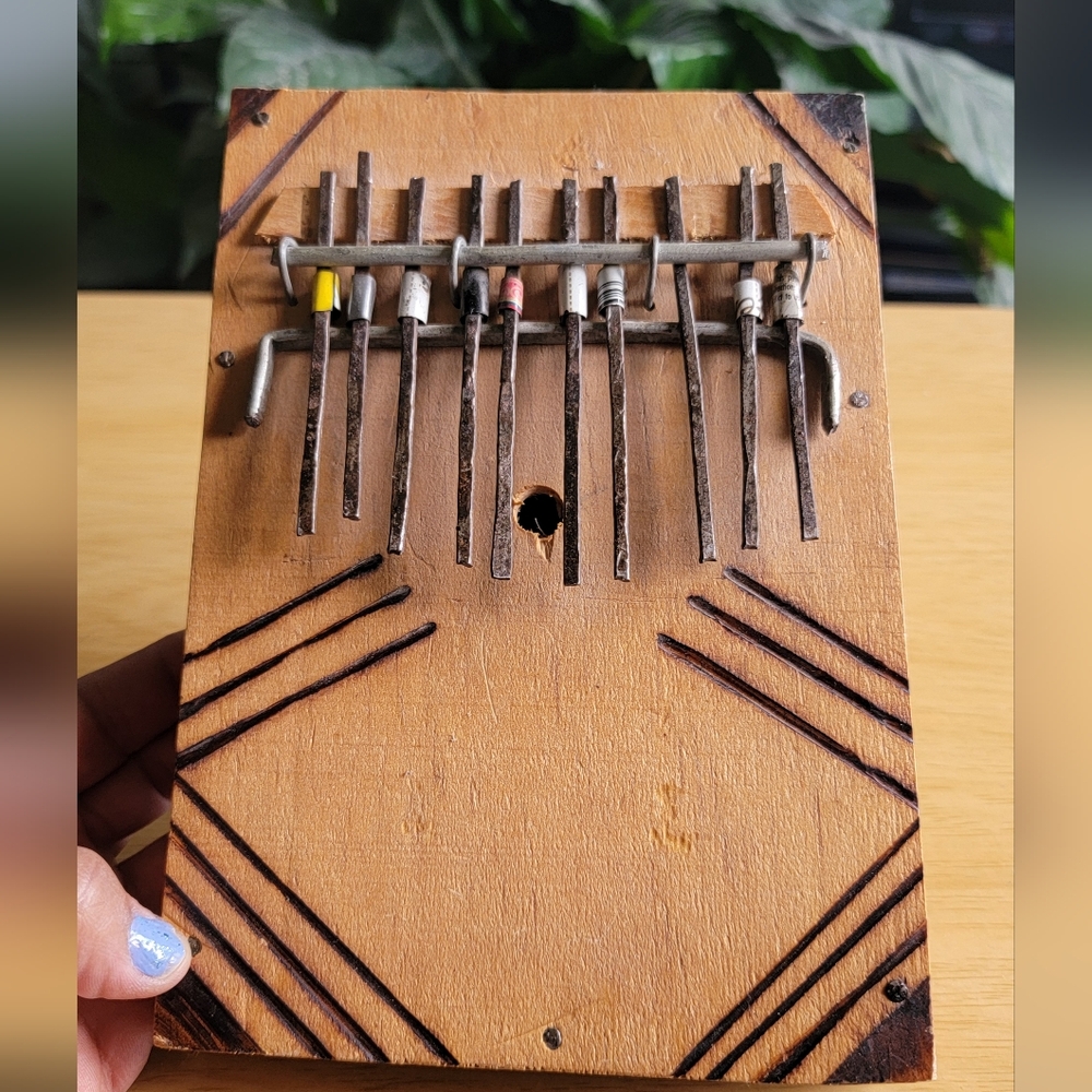 Handcrafted Wooden Kalimba with Brown Finish Made in Kenya.